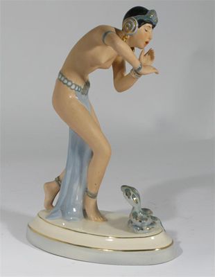 Appraisal: A Royal Dux figure of a snake charmer model no