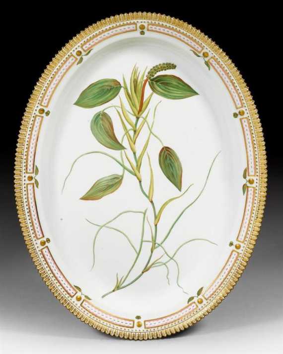 Appraisal: FOUR OVAL 'FLORA DANICA' PLATTERS Royal Copenhagen th century Decoration