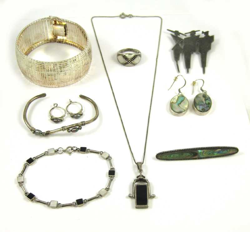 Appraisal: ELEVEN ARTICLES OF STERLING SILVER JEWELRY two bracelets a pendant