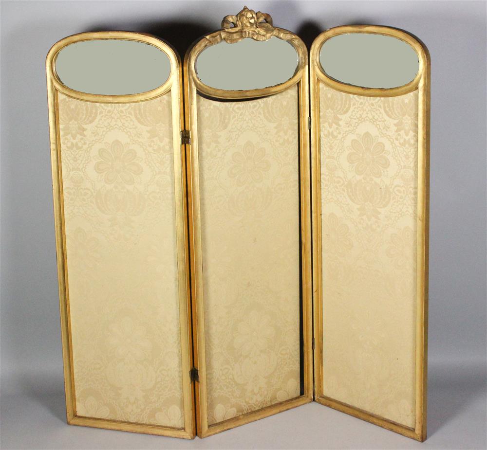 Appraisal: THREE PANELED CARVED AND GILT DECORATED UPHOLSTERED SCREEN the central