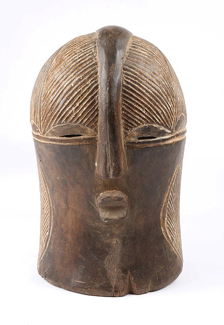 Appraisal: A CONGO SONGYE TRIBE WOODEN MASK with stylised incised decoration