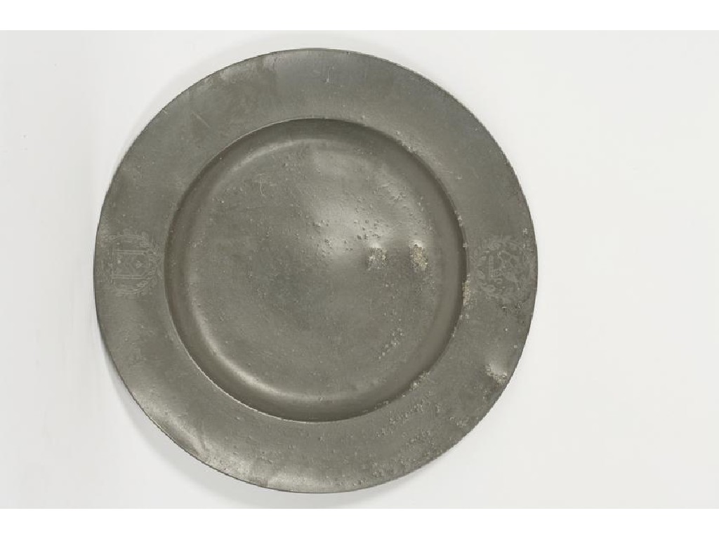 Appraisal: A CHARLES I PEWTER BROAD-RIM CHARGER engraved with the arms