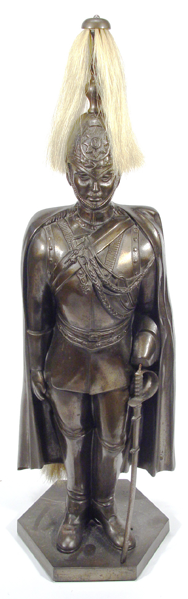 Appraisal: Large cast iron companion set modelled as a soldier with