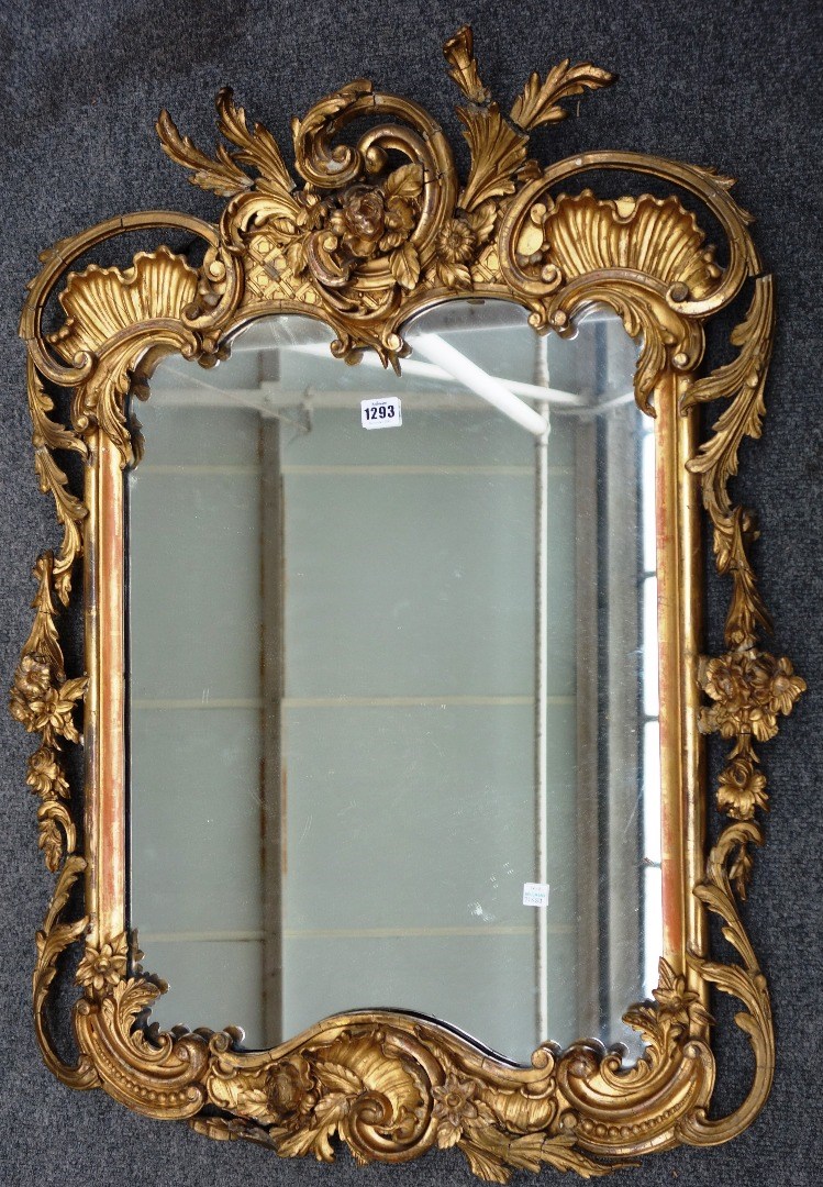 Appraisal: A Victorian gilt framed wall mirror with shell acanthus and