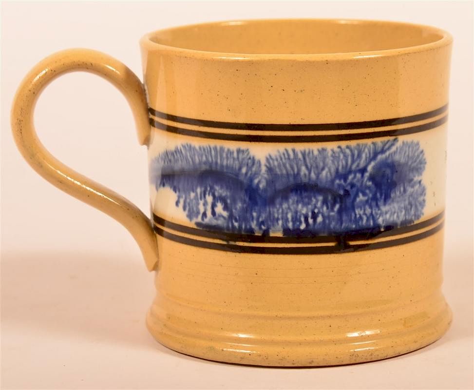 Appraisal: Yellowware Mug with Blue Mocha Seaweed Yellowware Mug with Blue