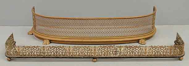 Appraisal: Curved brass fireplace screen with paw feet l and a