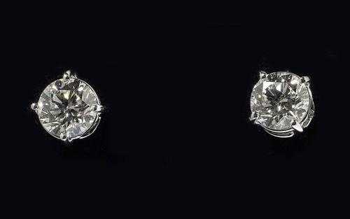 Appraisal: BRILLANT-CUT DIAMOND STUD EARRINGS White gold Elegant solitaire stud earrings