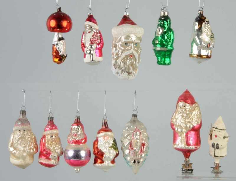 Appraisal: Lot of Blown Glass Santa Ornaments Description Includes two clip-ons