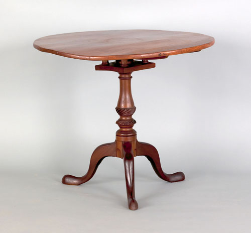 Appraisal: George III mahogany tea table ca the circular top tilting