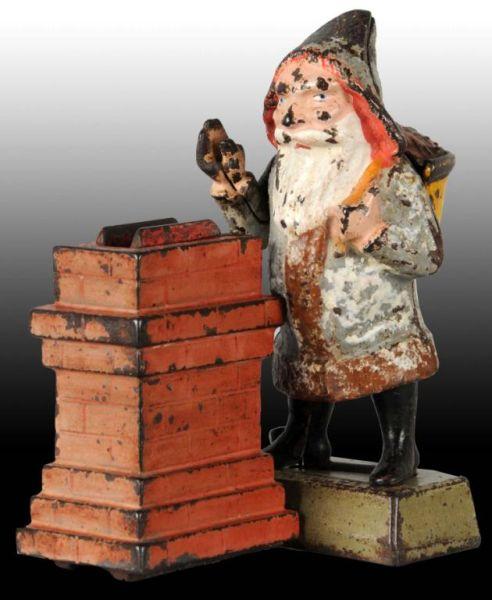 Appraisal: Cast Iron Santa at Chimney Mechanical Bank Description Manufactured by