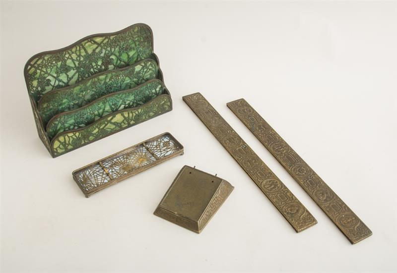 Appraisal: FOUR TIFFANY STUDIOS BRONZE AND GLASS DESK ACCESSORIES Each marked