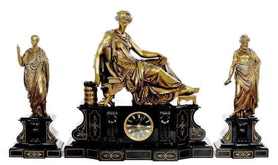 Appraisal: French bronze and slate clock garniture France circa figure of