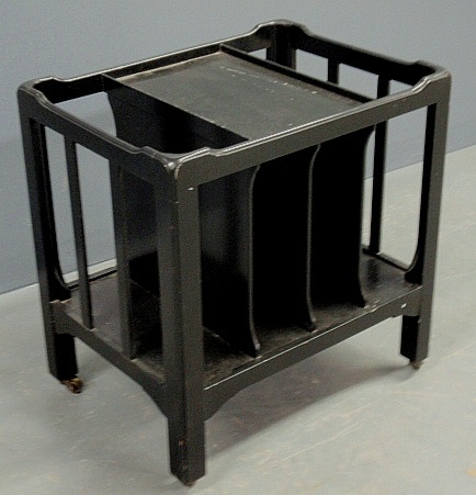 Appraisal: - Ebonized Canterbury or magazine stand by Baker Furniture with