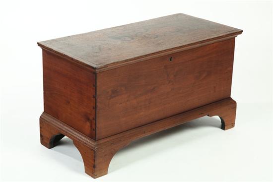 Appraisal: SMALL BLANKET CHEST American early th century walnut Applied molding