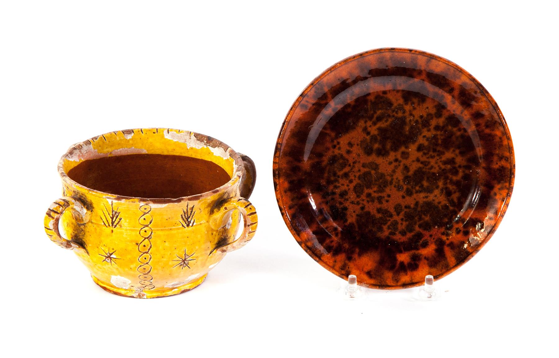 Appraisal: TWO AMERICAN REDWARE PIECES Mid th century Cup with four