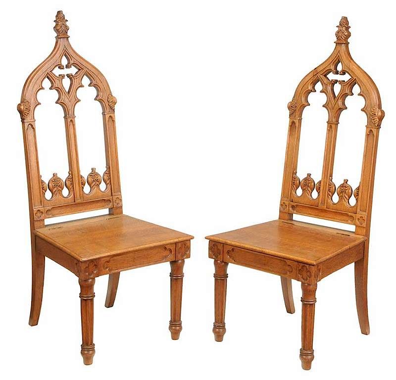 Appraisal: Pair Gothic Revival Carved Oak Hall Chairs American th century