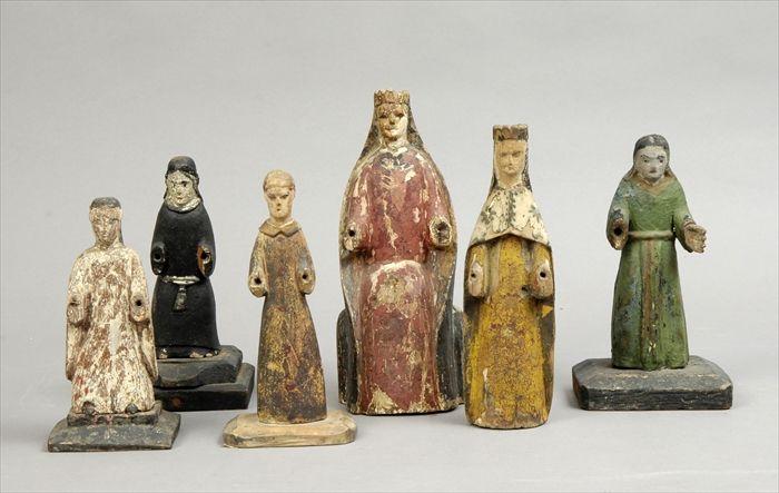 Appraisal: Six Polychrome Carved Wood Santos Figures to in Provenance The