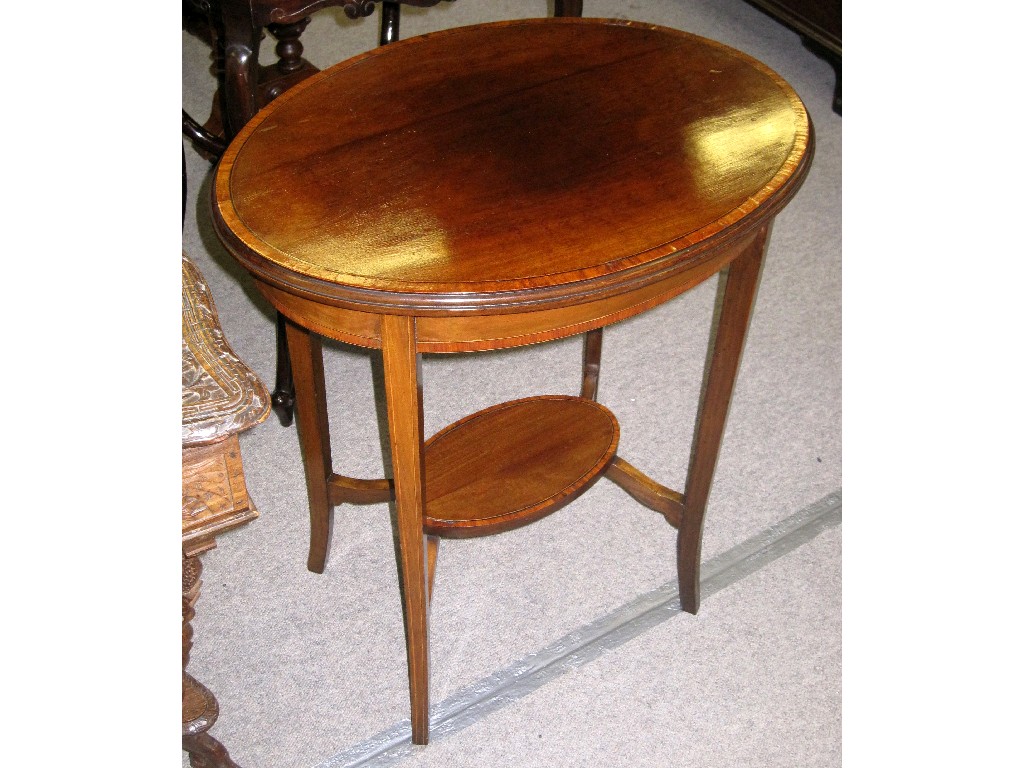 Appraisal: Edwardian mahogany and crossbanded oval occasional table