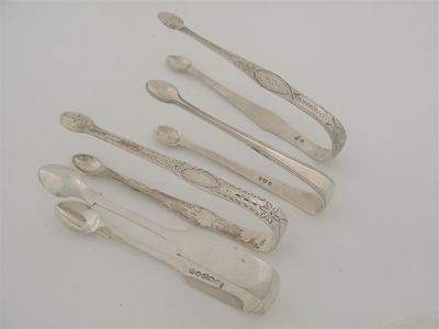 Appraisal: Four various pairs of sugar tongs including a Newcastle and