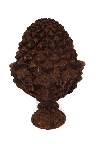 Appraisal: A set of four cast iron pine cone form finials