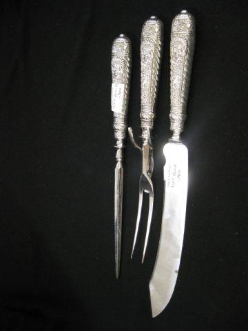 Appraisal: pc Victorian Silverplate Carving Set Assyrian Head by International knife