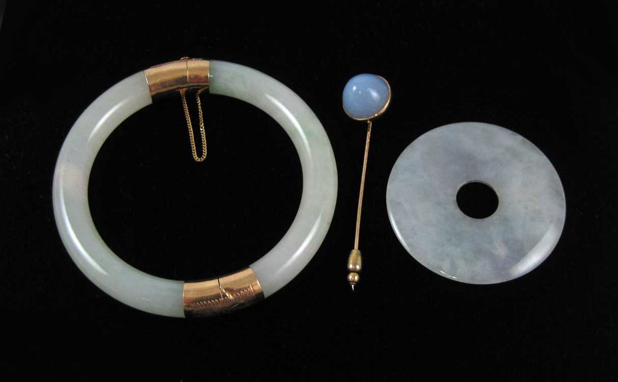 Appraisal: THREE ARTICLES OF JADE JEWELRY including a round hinged light