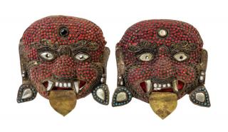 Appraisal: A Pair of Tibetan Coral and Turquoise Inset Brass Masks