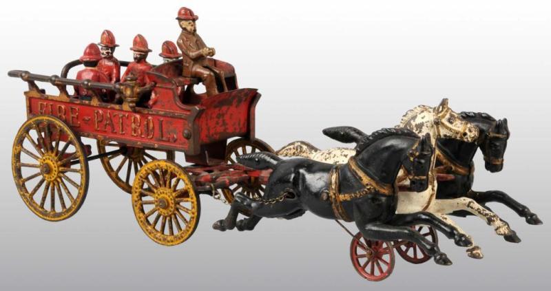 Appraisal: Cast Iron Hubley Horse-Drawn Fire Patrol Toy Description Pulled by