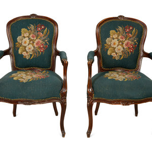 Appraisal: A Pair of Louis XV Style Walnut Fauteuils Late th