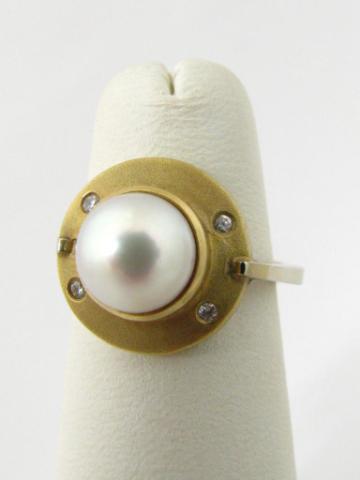 Appraisal: k yellow gold bezel set contemporary mm pearl and diamond