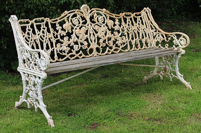 Appraisal: A WHITE PAINTED CAST IRON COLEBROOKDALE STYLE GARDEN BENCH with