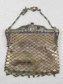 Appraisal: An Austrian silver mesh evening bag with raised swag decoration