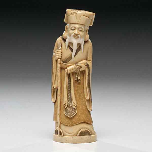 Appraisal: Japanese Ivory Immortal Japanese A carved and inked standing immortal