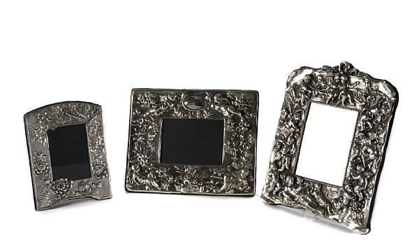 Appraisal: A group of three sterling faced photo frames after the