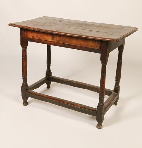 Appraisal: A CHARLES II OAK SIDE TABLE the rectangular plank construction