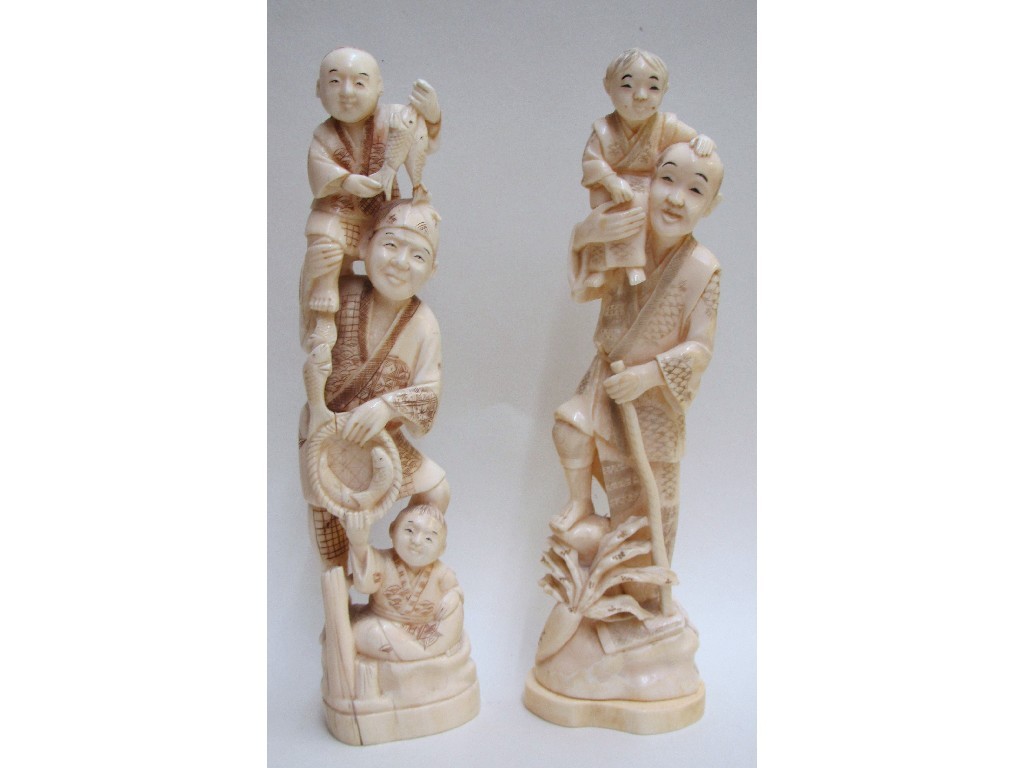 Appraisal: Two Japanese carved ivory figures of a fisherman and sons