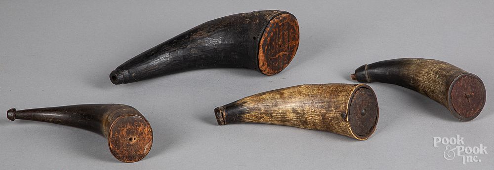 Appraisal: Four powder horns th c Four powder horns th c