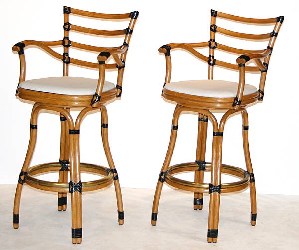 Appraisal: A set of three rattan 'Grand Cafe Galleria' swivel barstools