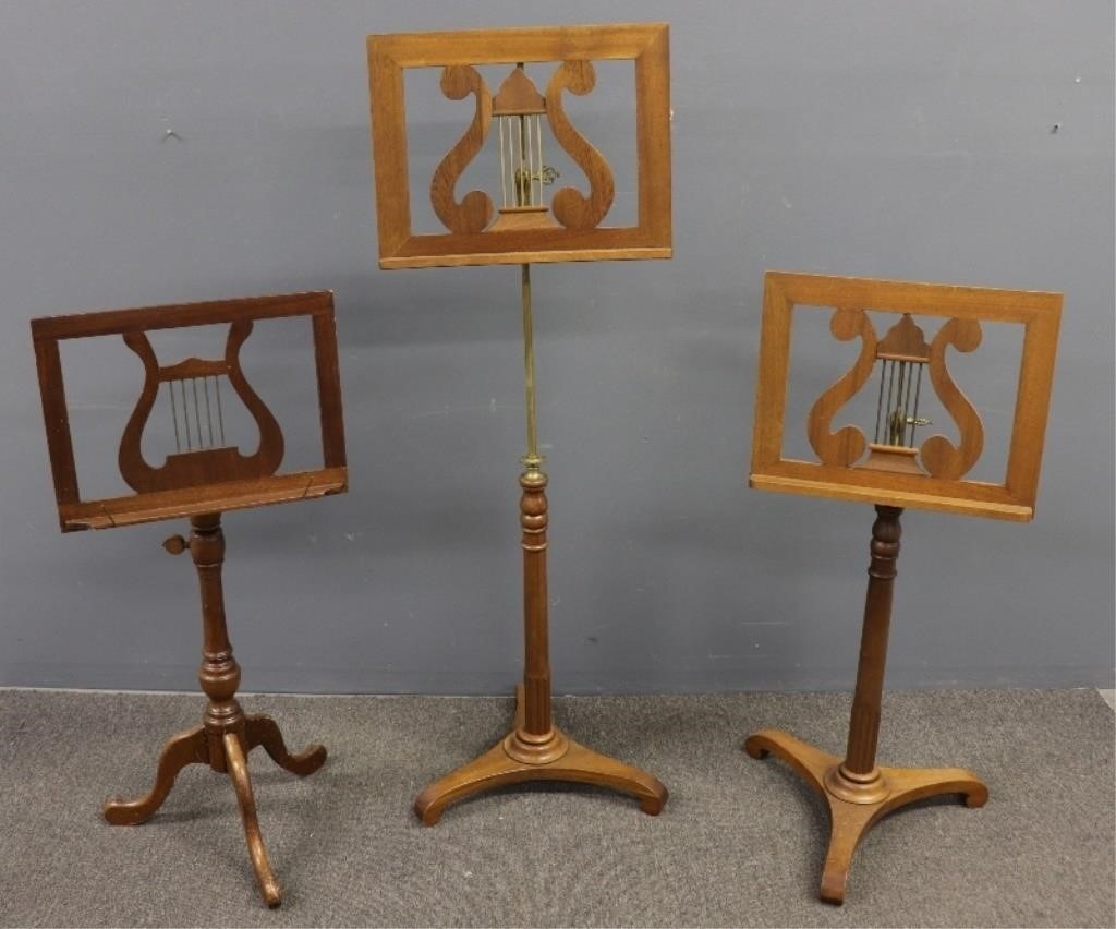 Appraisal: Pair of Italian mahogany adjustable music stands approximately h fully