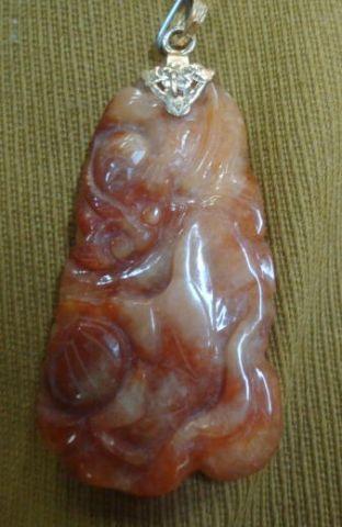 Appraisal: Carved Stone Carnelian Pendant with K Gold From a Queens