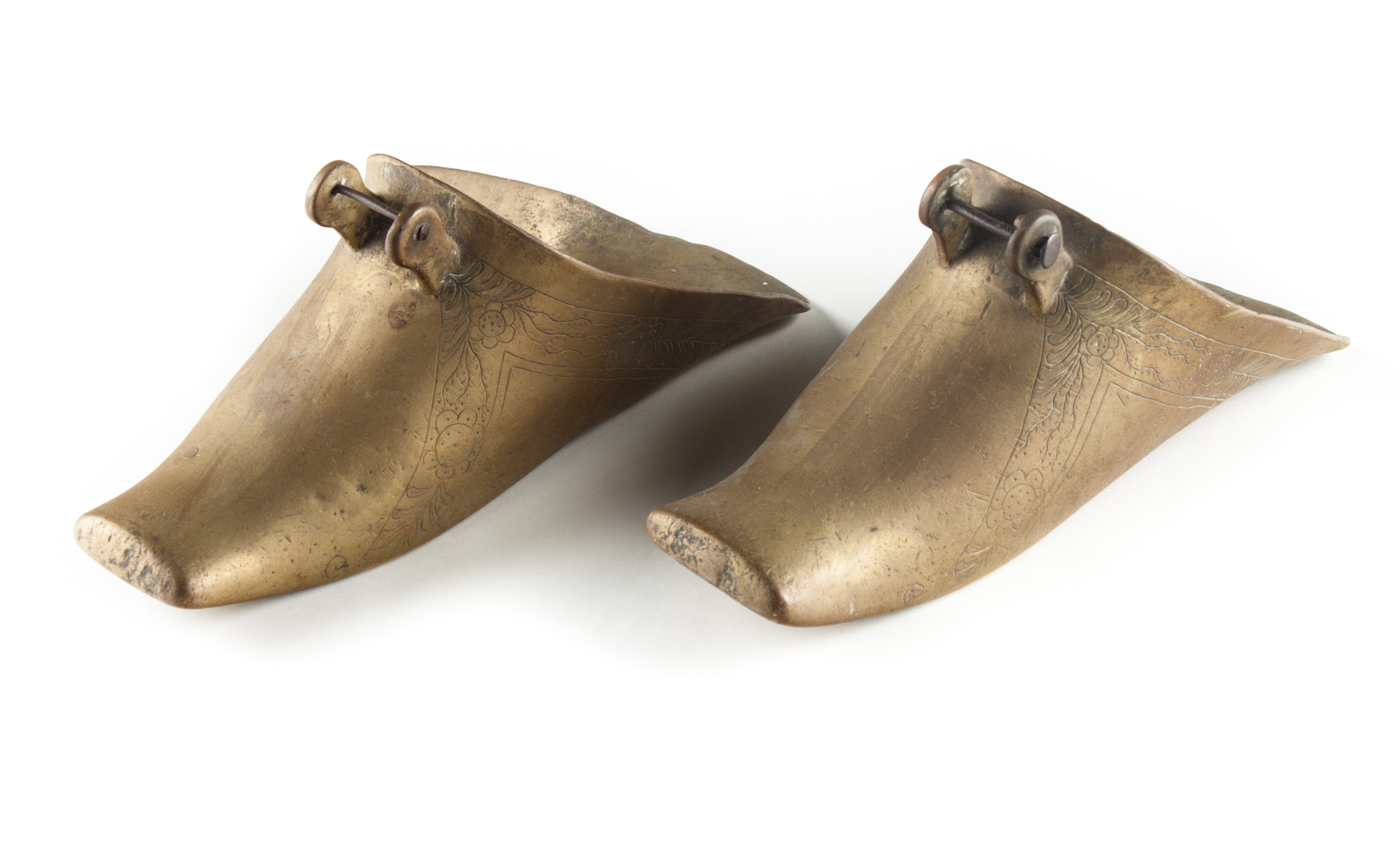 Appraisal: Pair of Spanish engraved brass stirrups th century in L