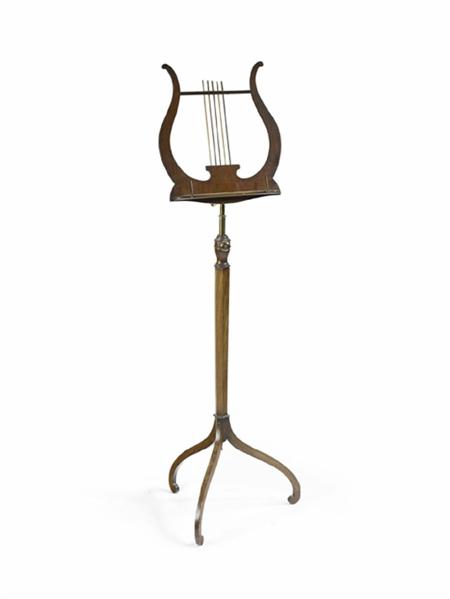 Appraisal: A Regency mahogany music stand the adjustable lyre shaped rest