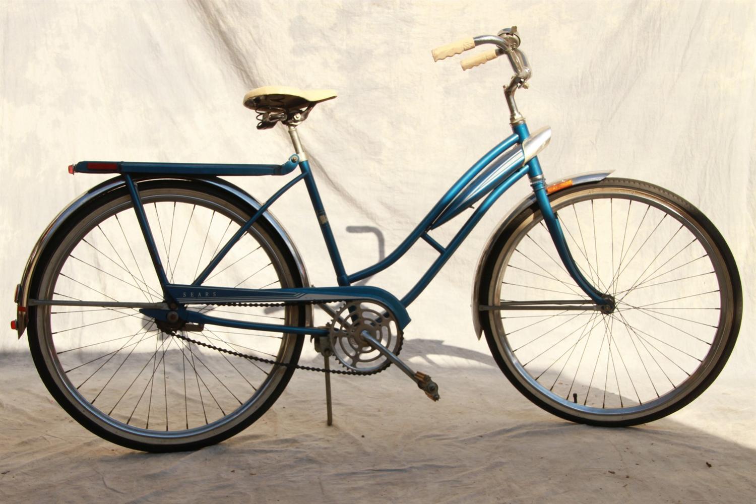 Appraisal: Sear's girl's bicycle blue white and chrome with working bell