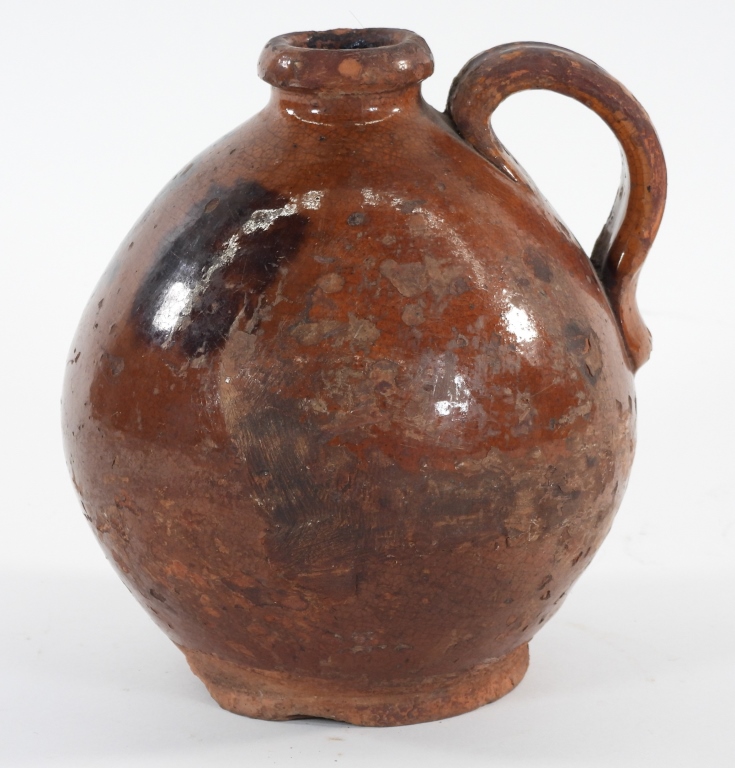 Appraisal: SPOTTED REDWARE HANDLED POTTERY JUG United States Late th- Early