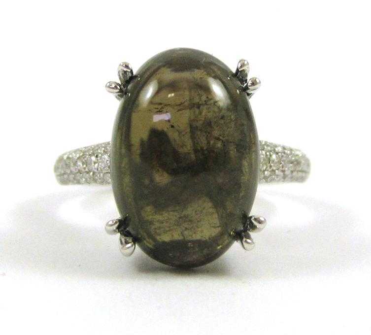 Appraisal: SMOKY QUARTZ AND FOURTEEN KARAT GOLD RING The white gold