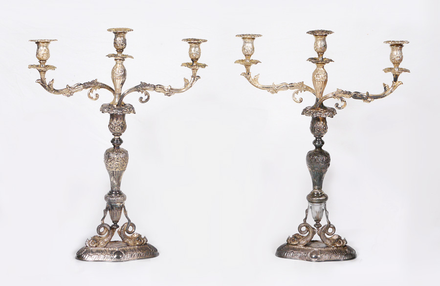 Appraisal: PAIR ORNATE FIGURAL DOLPHIN SILVERPLATE CANDELABRA light candelabra set with