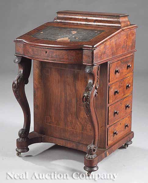 Appraisal: An English Carved Walnut and Burl Walnut Davenport Desk mid-