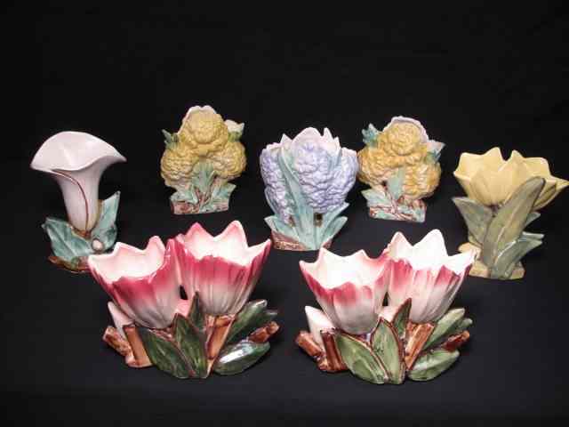 Appraisal: Group lot of seven assorted McCoy flower vases Includes colors