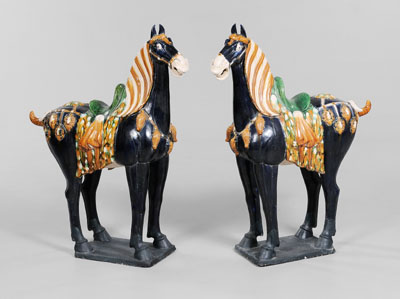 Appraisal: Pair Tang-Style Horses Chinese modern sancai glazed pottery standing foursquare