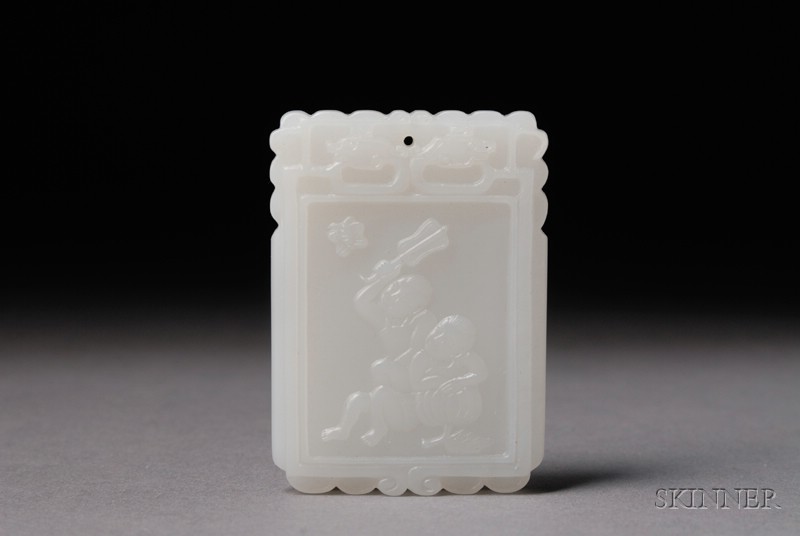 Appraisal: Jade Pendant China th century pure white stone surface carved